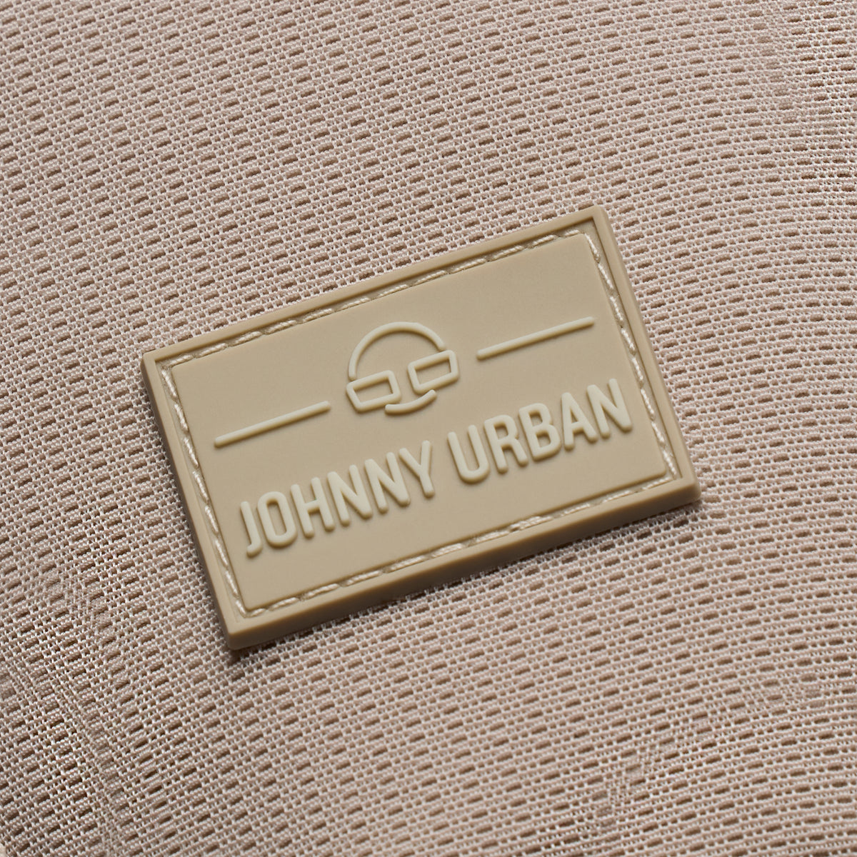 Beiges, wasserabweisendes Textilgewebe mit Johnny Urban Logo in gelbem Patch