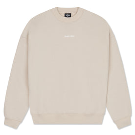 Beiges oversized Sweatshirt von Johnny Urban mit kleinem, weißem 'Johnny Urban' Print auf der Brust