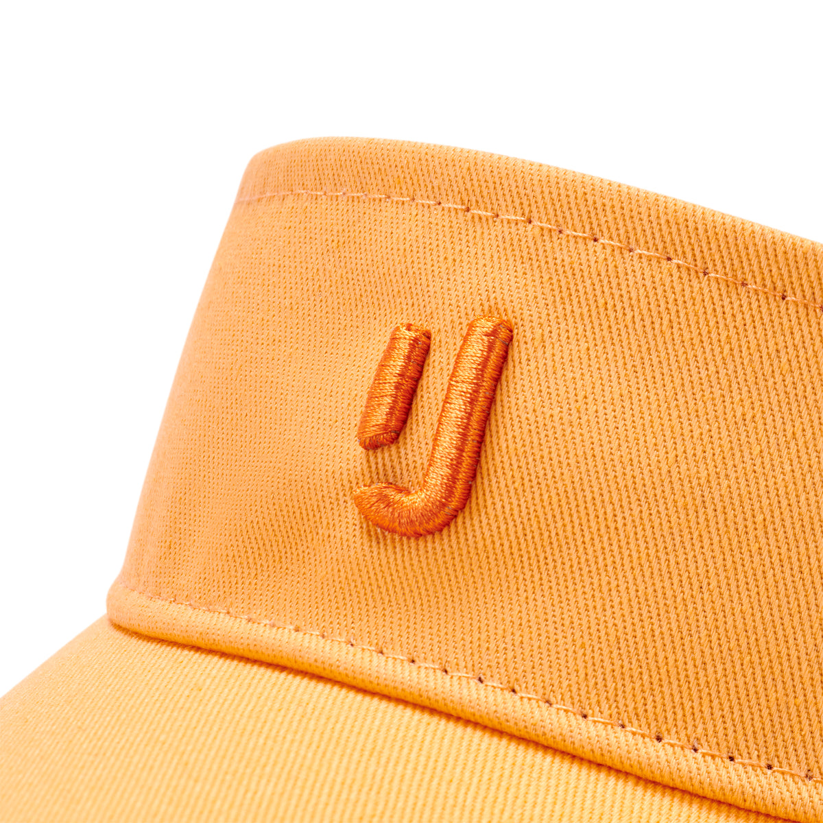 Pfirsichfarbener Sun Visor 'Terry' mit besticktem orangenem 'J'-Logo von Johnny Urban