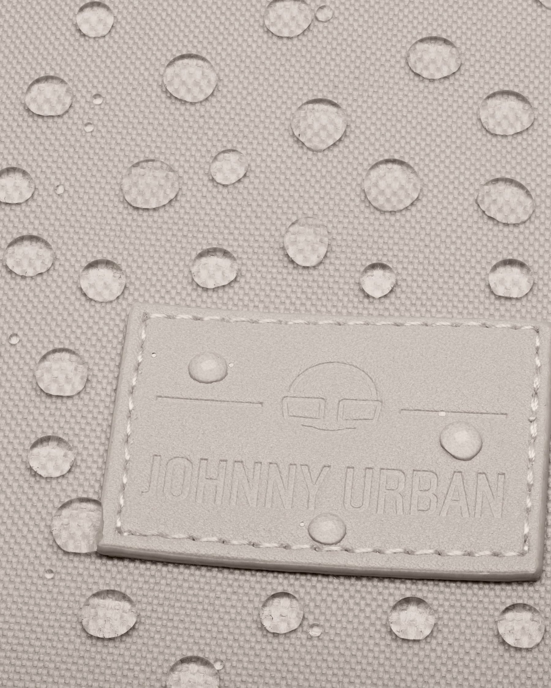 Wasserabweisendes Gewebe mit Johnny Urban Logo auf dem Business-Rucksack Jasper